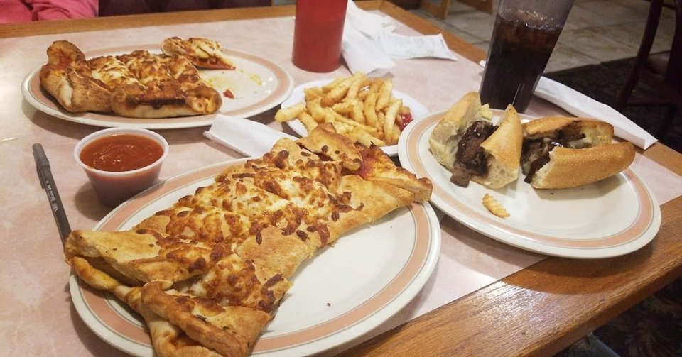 Menu page with sandwiches and cheeseburgers.